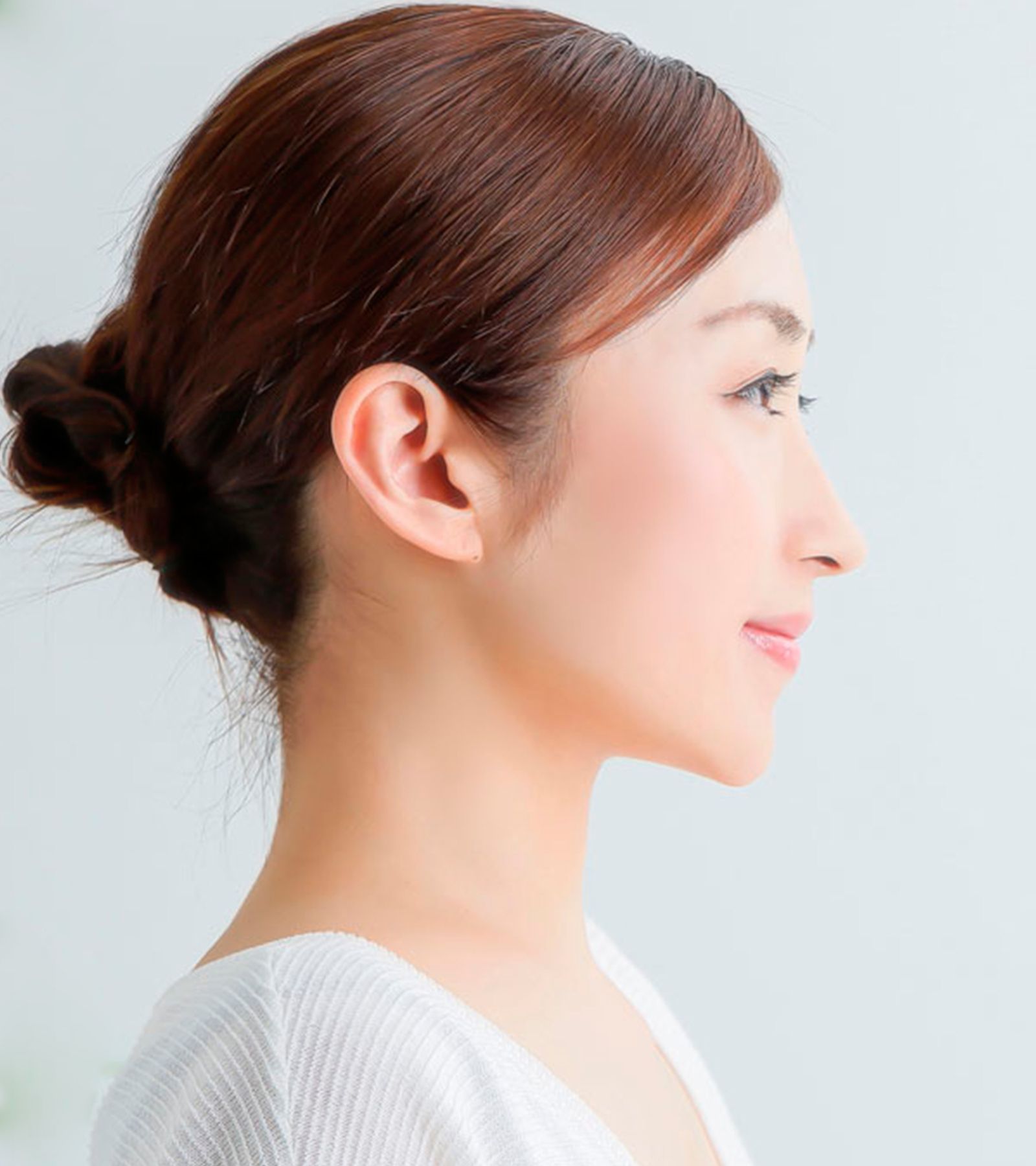 Asian woman shows off her rhinoplasty results